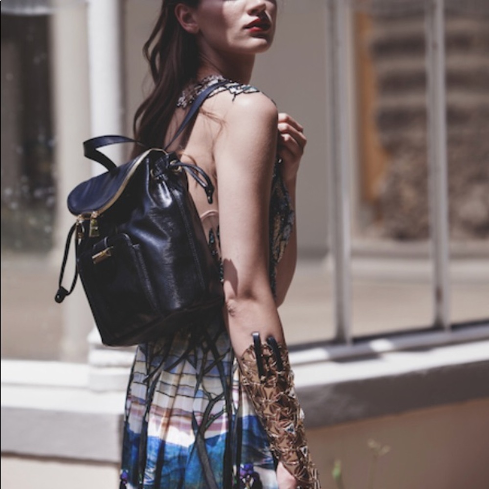 SNOB ESSENTIALS black faux leather mini backpack